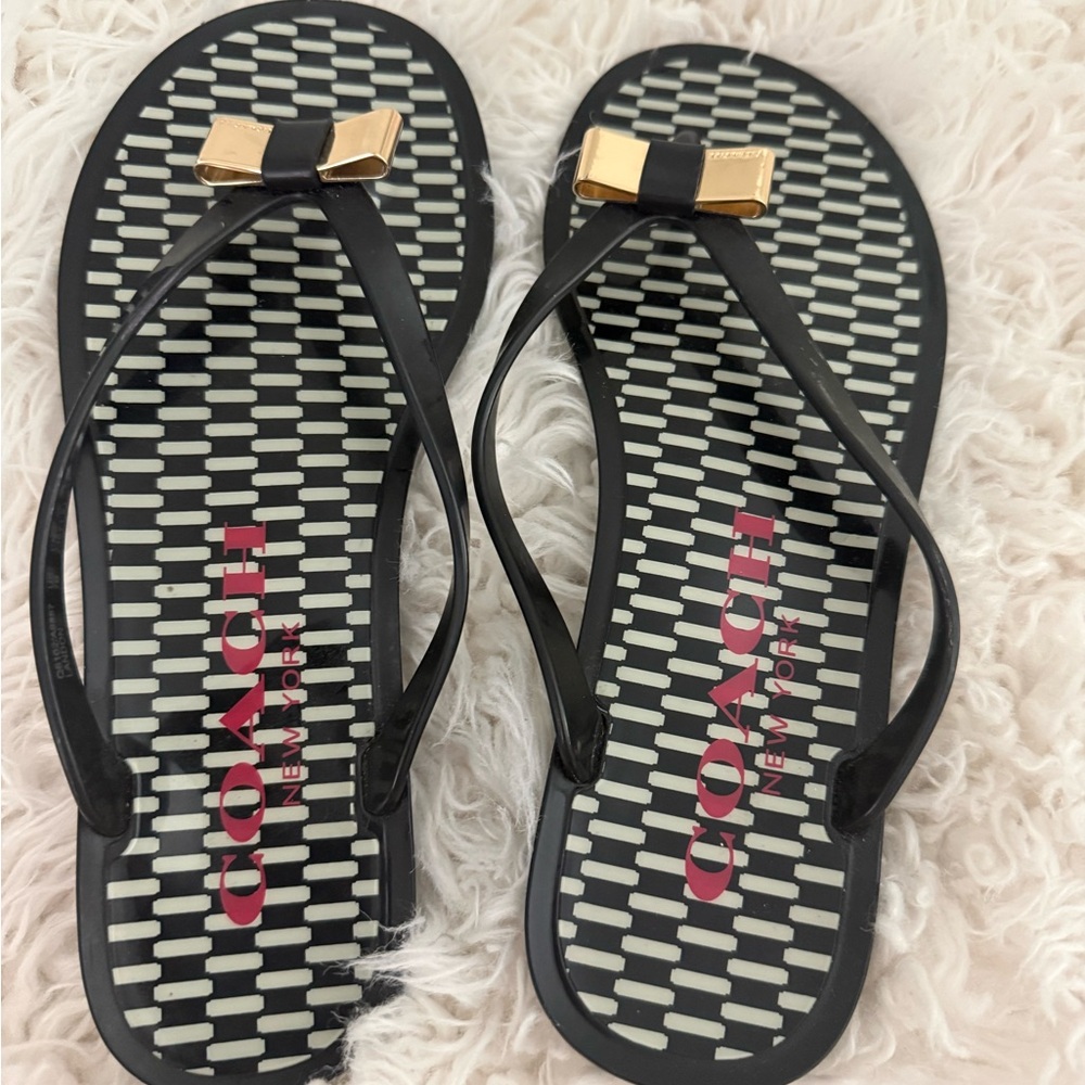 Coach Black Flip Flop Sandals with Gold Bow Accents